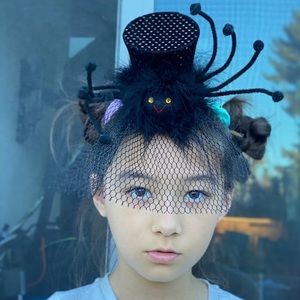 A spider headband is perfect for this Halloween.